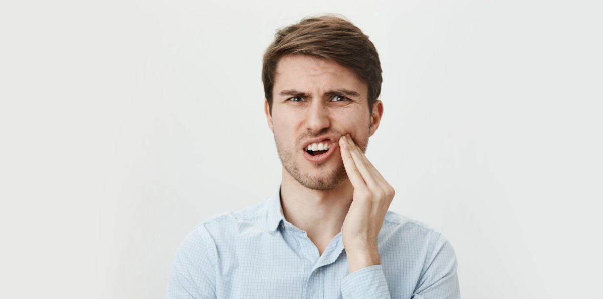 How Do Dental Crowns Address Issues Related to Teeth Grinding?